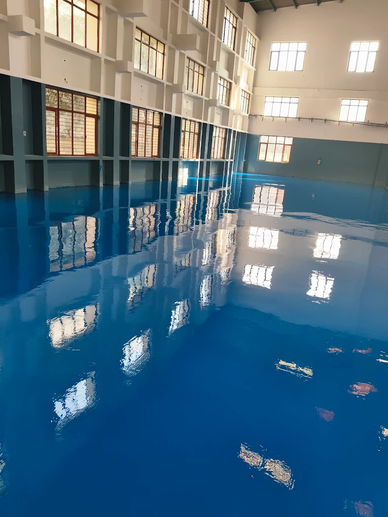 Epoxy flake floor installed in commercial garage space